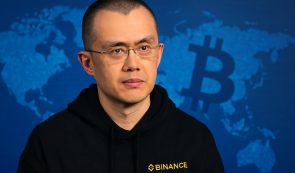 changpeng zhao with bitcoin background