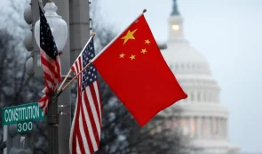 china and usa flags on background