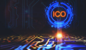 Initial Coin Offering (ICO) acronym glowing above a futuristic circuit board.