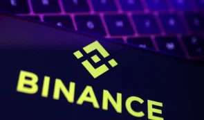 Binance logo on phone