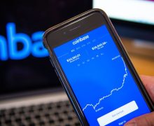 The Coinbase application on a smartphone arranged in Hastings-on-Hudson, New York, U.S., on Monday, Jan. 4, 2021. Coinbase Inc. knew cryptocurrency XRP was a security rather than a commodity and "illegally" sold Ripple Labs Inc.'s tokens anyway, a customer argues in a proposed class-action lawsuit over the commissions the crypto exchange collected. Photographer: Tiffany Hagler-Geard/Bloomberg