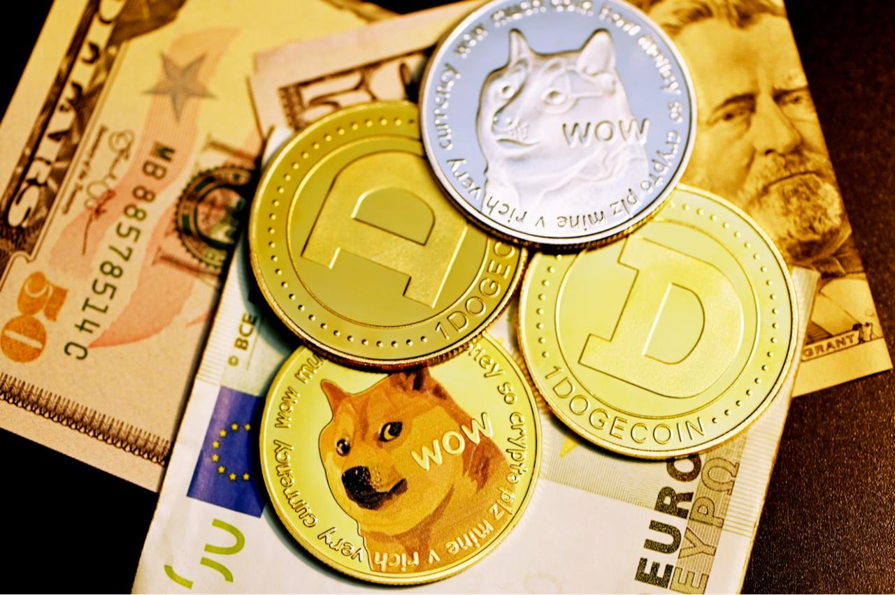 Dogecoin (DOGE) token on top of dollars usd