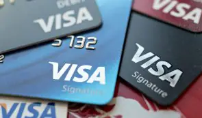 Visa cards next to each other
