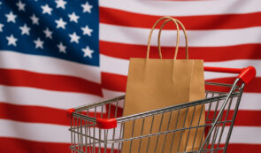 USA flag and a shopping cart with a shopping bag