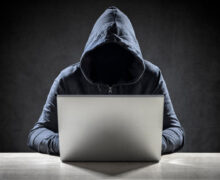 Hacker on laptop