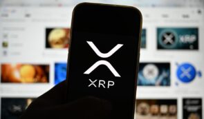 XRP logo on phone screen