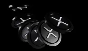 3D rendering of sleek black and white XRP cryptocurrency token coins floating against a dark background.